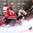 HELSINKI, FINLAND - DECEMBER 29: Switzerland's Dario Meyer #14 gets the puck past Canada's Mackenzie Blackwood #29 to score Team Switzerland's second goal of the game during preliminary round action at the 2016 IIHF World Junior Championship. (Photo by Matt Zambonin/HHOF-IIHF Images)

